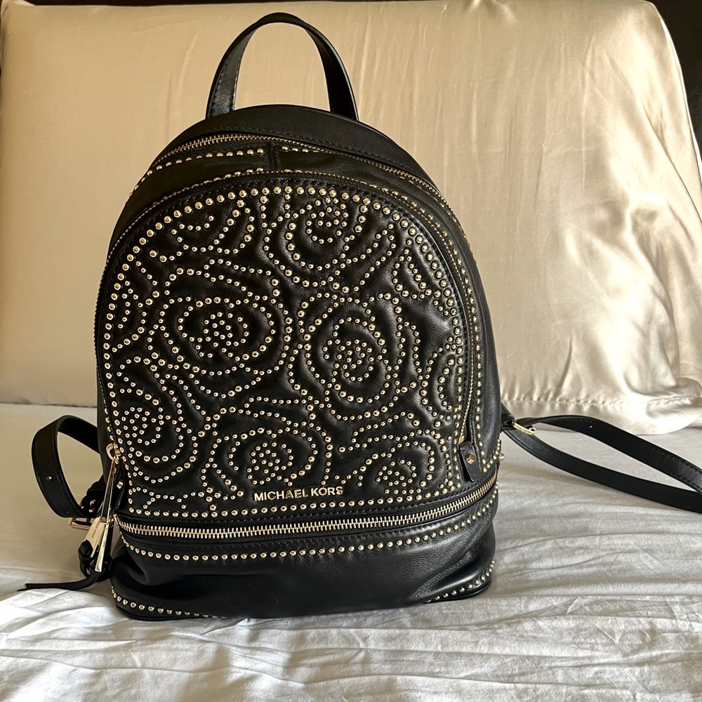 Michael Kors medium Reah backpack, black with gold hardware.